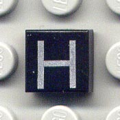 Tile 1 x 1 with Silver Capital Letter H Pattern