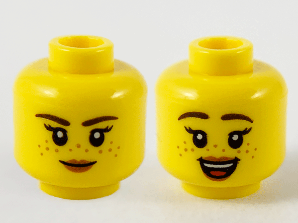 Minifigure, Head Dual Sided Female Dark Brown Eyebrows, Medium Nougat Freckles, Peach Lips, Neutral / Open Smile Pattern - Hollow Stud