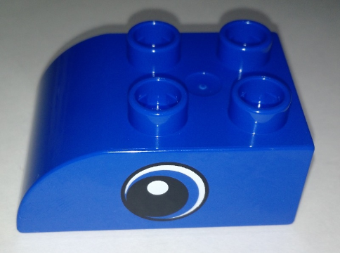 Duplo, Brick 2 x 3 Slope Curved with Circled Black Eye with Crescent and White Pupil Pattern on Both Sides