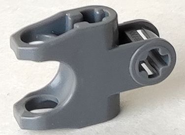 Technic, Axle Connector 2 x 3 with Ball Joint Socket - Closed Sides, Angled Forks with Open Axle Holes